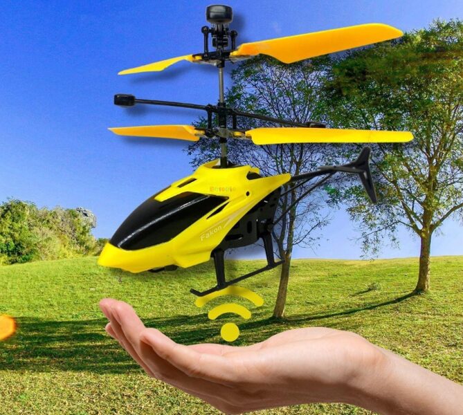 Mini lidojošais helikopters bērniem ar pretnokrišanas sensoru( žestu kontrole ) un pulti ieslēgšanai un izslēgšanai, uzlādējams, LED apgaismojums, dzeltenā krāsā